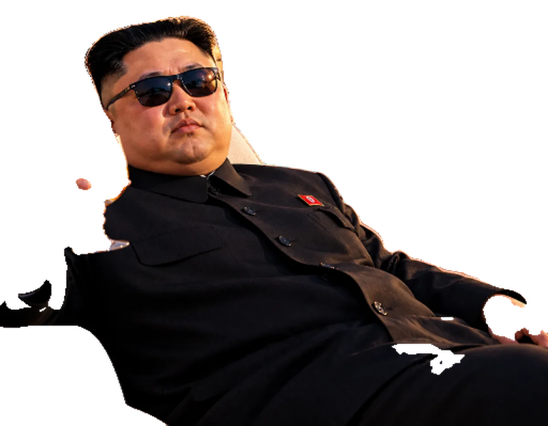 Kim Yacht reclining in a buttoned black jacket and sunglasses